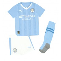 Camiseta Manchester City Rico Lewis #82 Primera Equipación Replica 2023-24 para niños mangas cortas (+ Pantalones cortos)